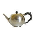 A fine quality and rare Irish Georgian (George II period) silver bullet Teapot, the hinged circular ... 