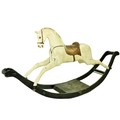 A good old Edwardian black and white painted wooden Rocking Horse, with leather saddle, 211cms (83