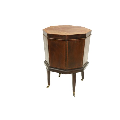 414 - An Irish 19th Century inlaid mahogany octagonal shaped Wine Cooler, with lift top and lead lined int... 
