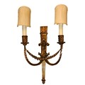 A pair of 19th Century giltwood two branch Wall Lights, decorated in the Adams taste with drape desi... 