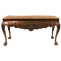 A good quality 19th Century Irish mahogany Side Table, the plain top with gadroon edge over a shaped... 