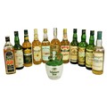 Collection of 12 Bottles of Irish Whiskey, (whiskies pre-2002). (12)