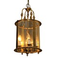 A Georgian style brass Hall Lantern, with domed glass and shaped supports, 2' high (61cms). (1)... 