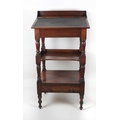 An early 19th Century mahogany Porters Desk, with lift up top on turned supports and legs. (1)