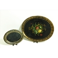 A large early 19th Century oval papier-mache Tray, the rim decorated with gilded anthemions and the ... 