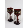 A pair of Victorian ruby glass Lustre Vases, with spear shaped drops, 14 1/4