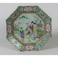 An early Chinese Famille Rose octagonal Plate, decorated in colourful enamels depicting two boys hol... 