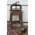 A metal Book Press, on wooden stand, together with Vice. (2)