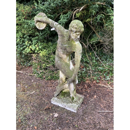 100 - A nicely weathered composition Figure, of naked disc thrower by a tree stump on rectangular base, 64... 