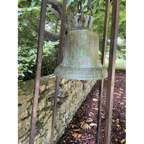 103 - A very heavy Victorian cast bronze Yard Bell, by Warner & Sons London 1874, on later tall wrough... 