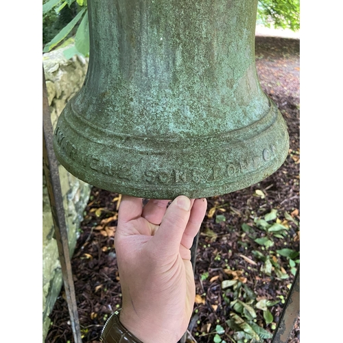 103 - A very heavy Victorian cast bronze Yard Bell, by Warner & Sons London 1874, on later tall wrough... 