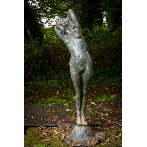 112 - A fine bronze Garden Figure, life size, modelled as a Nude Girl with arms crossed behind her head an... 