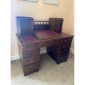 A Victorian mahogany pedestal Desk, the hinged slope top flanked to either side with a bank of four ... 