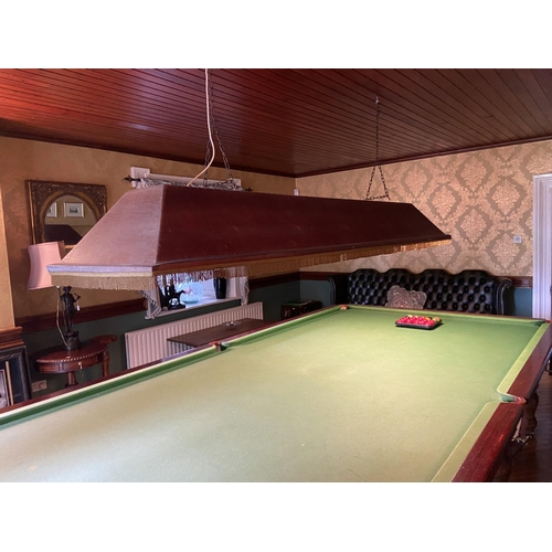 241 - A full size Billiard / Snooker Table, in mahogany and covered in green baize raised on 8 heavy turne... 
