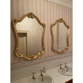 An attractive pair of gilt cartouche shaped Wall Mirrors, in scroll work frames, 43'' x 31'' (109cms... 