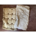 Three faux sheep wool Rugs, and two similar Cushions and a colourful floral Print. (5)... 