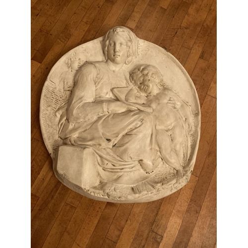 616 - An attractive plaster cast medallion shaped Plaque, depicting Madonna & Child, approx. 35