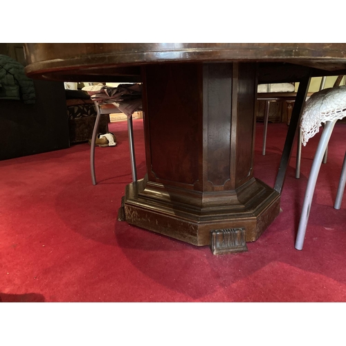 633 - A Victorian style lacquered oval Breakfast Table, on heavy plinth base, together with three metal Pa... 