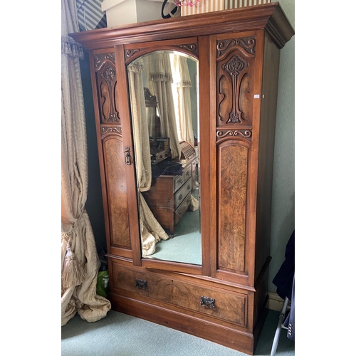 74 - An Edwardian walnut Wardrobe, with mirror door and base drawers, 77'' x 48'' (195cms x 122cms); a ma... 