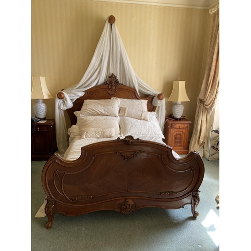 91 - A 4'6'' French walnut cartouche shaped Bed, with bedspread, cushion and drapes. (1)