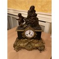 A French gilt metal mounted and polished black marble Mantle Clock, with silk suspension movement an... 