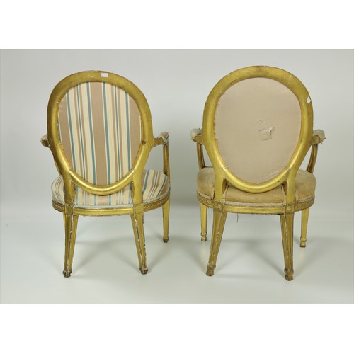 514 - A pair of George III giltwood Open Armchairs, in the manner of John Linnell, each with channelled fr... 