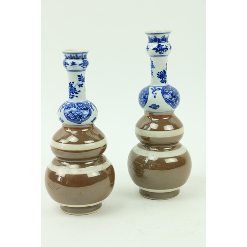 30 - Two similar Xiangshi period (1663 - 1728) triple gourd blue and white Café au Lait Vases, with flora... 