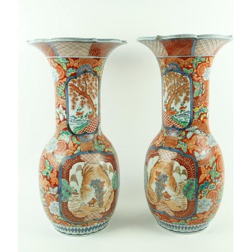 74 - A pair of attractive and heavy 19th Century Japanese porcelain Vases, of flared and bulbous form, th... 