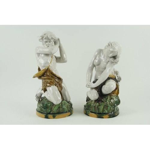 79 - A rare pair of late 19th Century Mintons Majolica Figures, modelled as Adam & Eve wearing animal... 