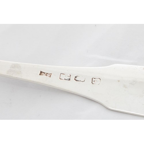 722 - An Irish George III monogrammed silver fiddle pattern Skimming Spoon, by Samuel Neville, Dublin 1801... 