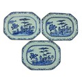 A good set of three Nankin Chinese porcelain blue and white Platters, decorated with trees and shrub... 