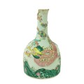 An 18th Century Chinese Famille Verte Bottle Vase, with four claw dragon, in relief, over jumping ca... 