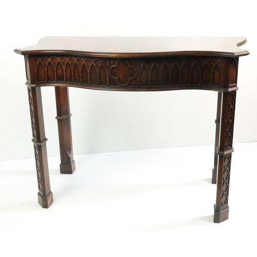 407 - An attractive pair of mahogany Side Tables, attributed to Hicks of Dublin, in the Gothic manner, the... 