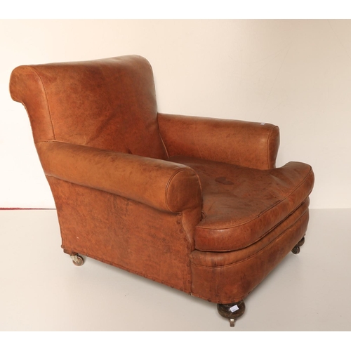 433 - A pair of tan hide covered Club Type Armchairs, in the style of Howard, London, with loose cushion s... 