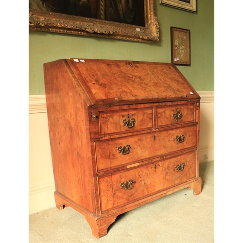 457 - A very fine George II period walnut slope front Bureau, the finely figured crossbanded top and drop ... 