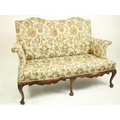 A late 18th Century double hump back walnut Settee, with padded back, arm panels and serpentine fron... 