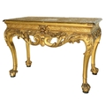 A highly important pair of Irish carved giltwood and gesso Side Tables, c. 1738, each rectangular to... 