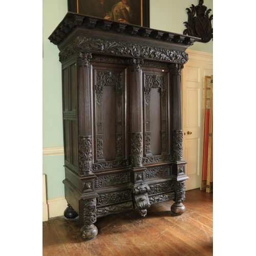 570 - A fine quality early Flemish Renaissance Court Cupboard or Armoire, with dental moulded corbel corni... 