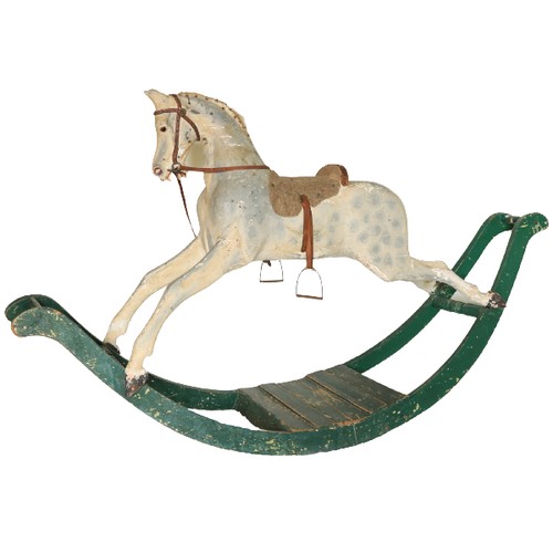 304 - A large Victorian Rocking Horse, painted grey on a green arched base. (1)