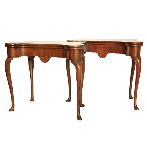 482 - A fine pair of 18th Century red walnut fold-over Card Tables, probably Irish, each with front rounde... 