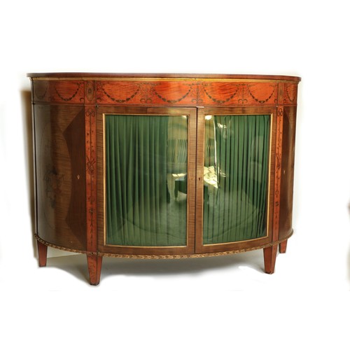 511 - A pair of fine quality Georgian style mahogany and satinwood bow fronted Commodes, attributed to Jam... 