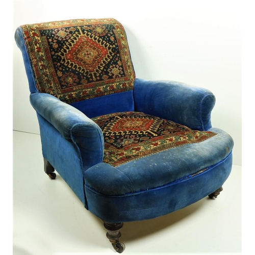 629 - A good Victorian Easy Armchair, probably by Strahan, Dublin, covered in blue velvet and tapestry pan... 