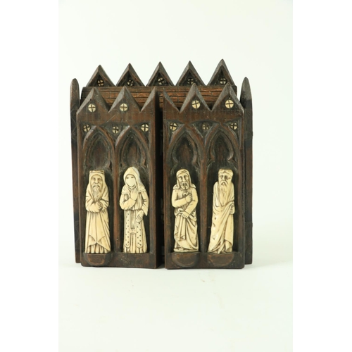 824 - An early carved wooden triptych Altarpiece, depicting the stable at Bethlehem, with the Infant Jesus... 