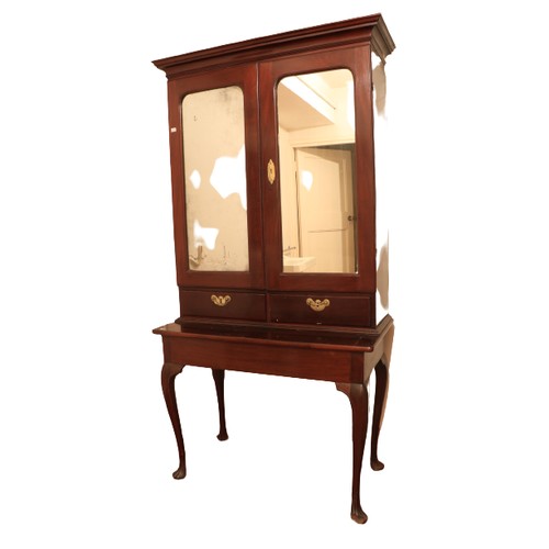 623 - A mahogany Cabinet on Stand, 19th Century Irish in the 18th Century style, the moulded cornice above... 