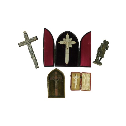 886 - A collection of miscellaneous Religious Artefacts, comprising a cased mother-o-pearl Crucifix, anoth... 