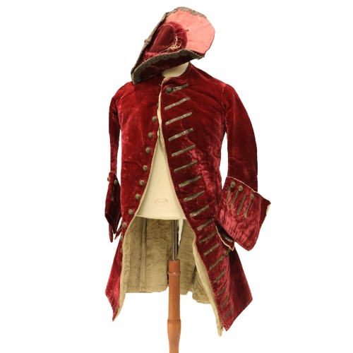 947 - A rare late 18th Century dark red velvet Gentleman's Jacket, lined with fur and felt, two flap over ... 