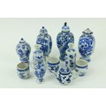 A selection of six blue and white miniature Vases, (four with covers); a miniature blue and white Ew... 