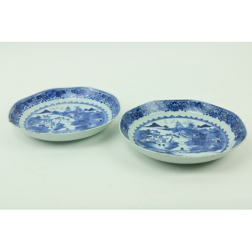 35 - A pair of Kangshi blue and white Chinese porcelain Dishes, each decorated with figures and residence... 