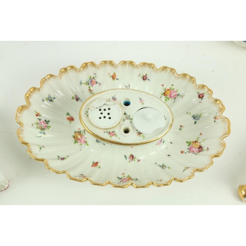 104 - A late 19thy Century oval shell shaped French porcelain Desk Stand, with floral decoration, 10 1/2