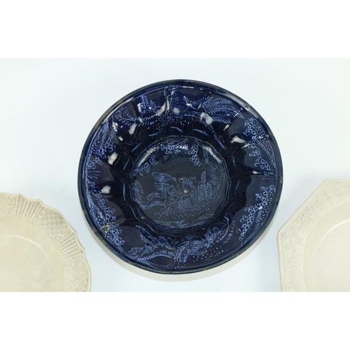 116 - An 18th Century English salt glaze octagonal Bowl, with moulded scrolling foliage, 9